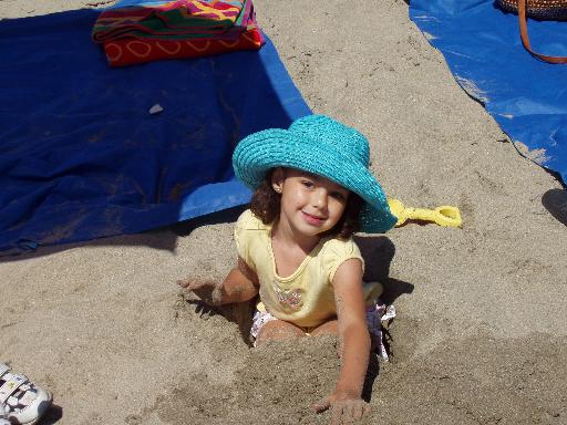 P6030042 Burying her legs in the sand