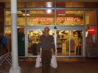 P9020038 Larry in front of Larry's Market